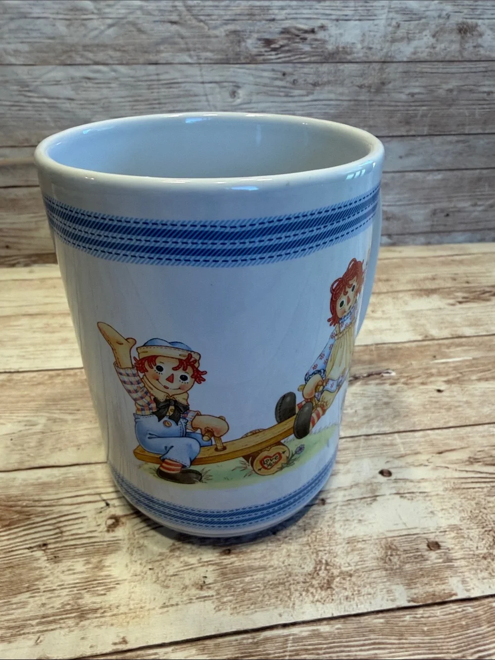 Vintage Raggedy Ann and Andy Ceramic Coffee Mug with Cartoon Illustration